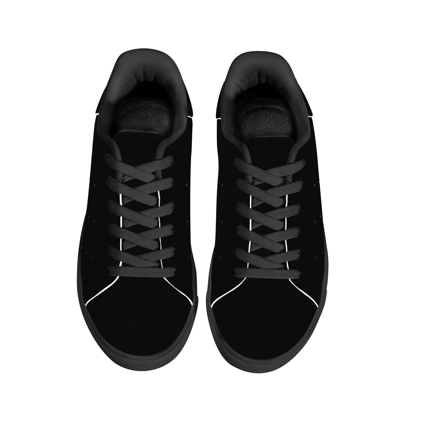 All-black Jamaica flag Ackee Walkers low top sneakers with black laces, black outsole and a green and gold Jamaican flag chevron at the heel