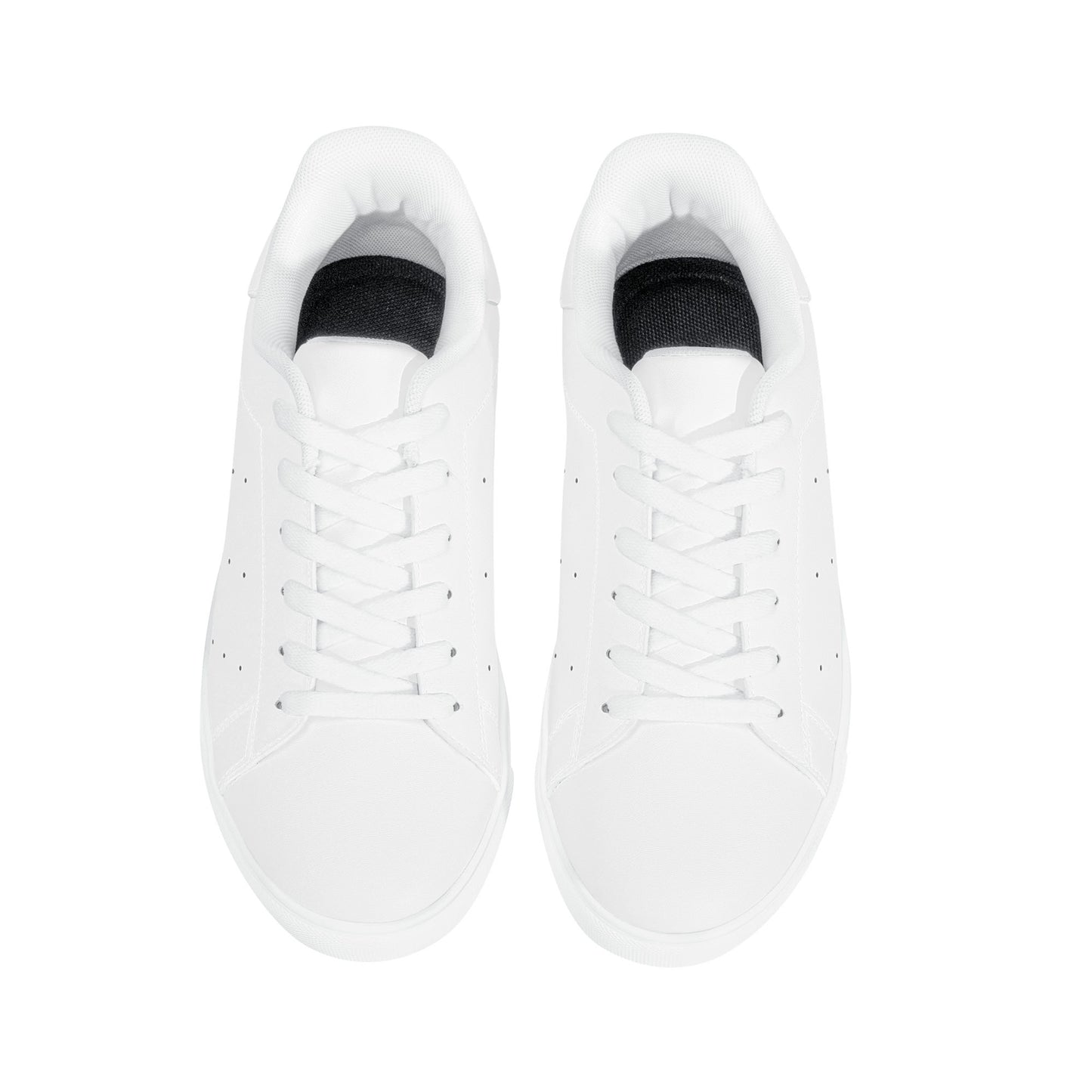 Solid white Ackee Walkers low top sneakers, black laces and black outsole