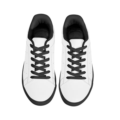 Solid white Ackee Walkers low top sneakers, black laces and black outsole