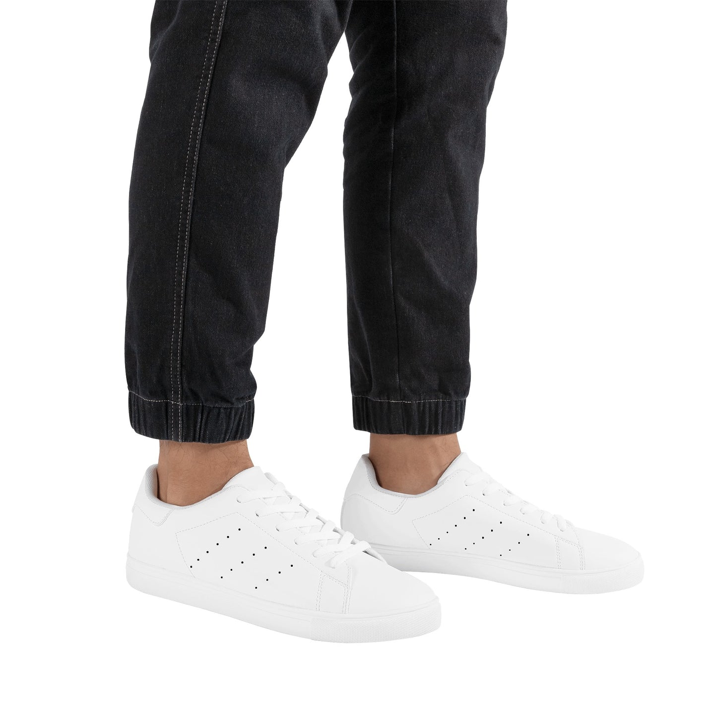 Solid white Ackee Walkers low top sneakers, black laces and black outsole