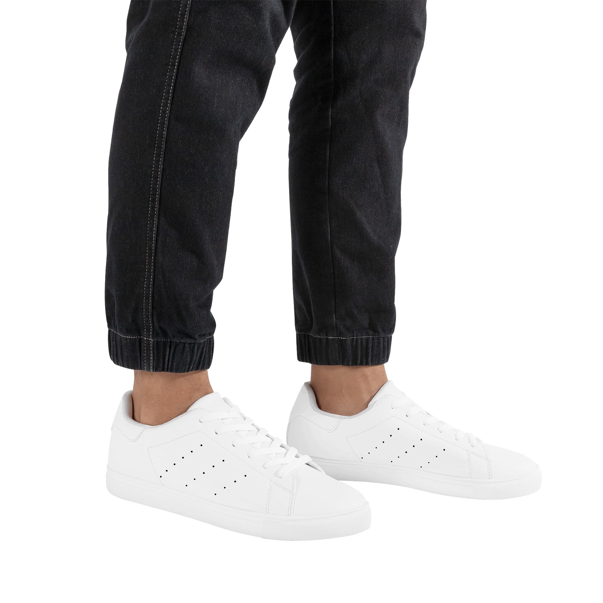 Solid white Ackee Walkers low top sneakers, black laces and black outsole