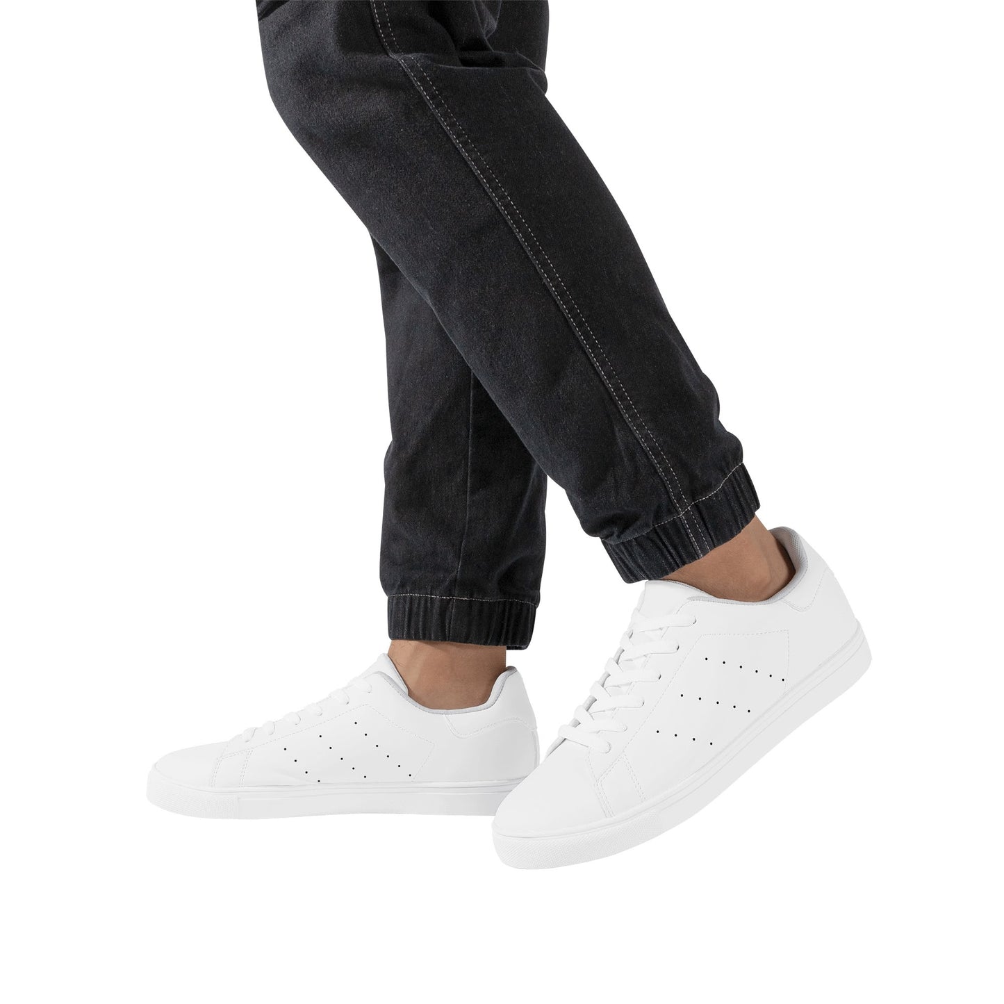Solid white Ackee Walkers low top sneakers, black laces and black outsole
