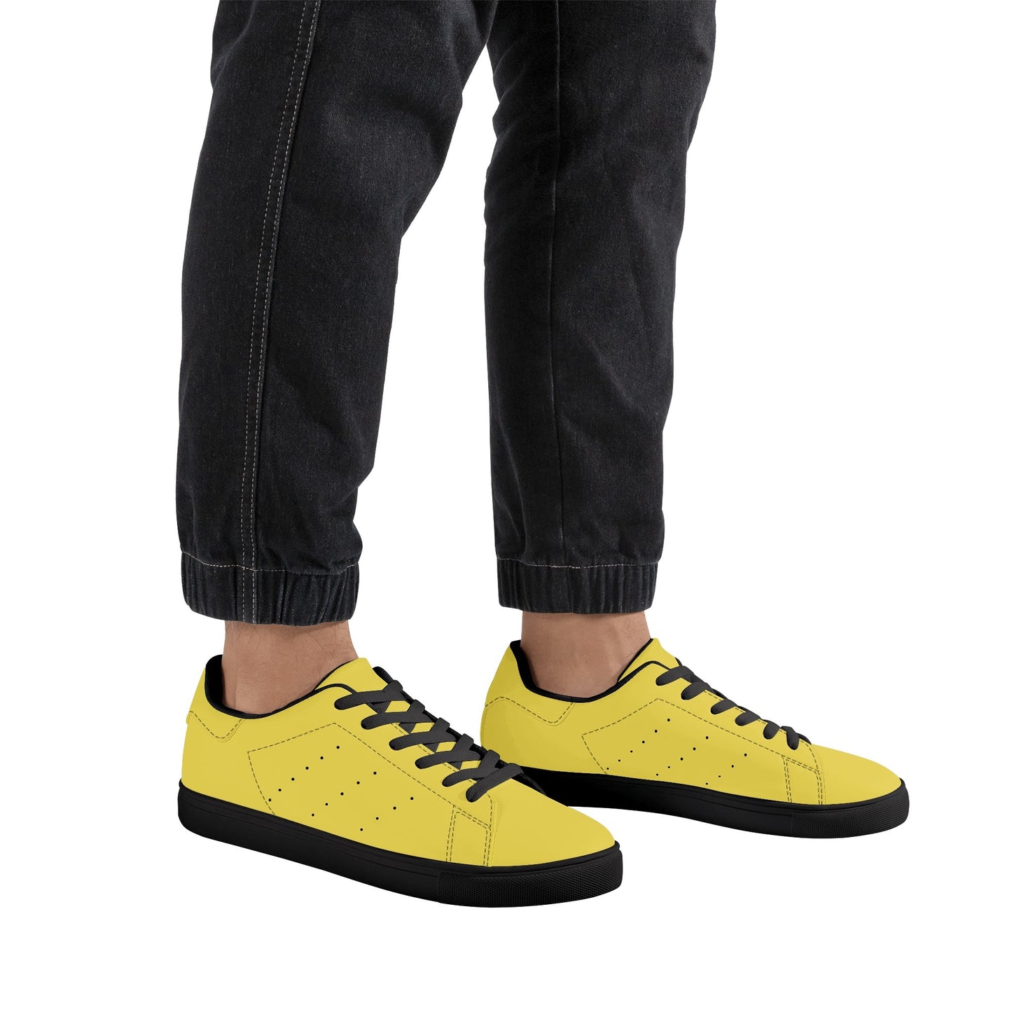 Solid marigold yellow Ackee Walkers low top sneakers, black laces and black outsole