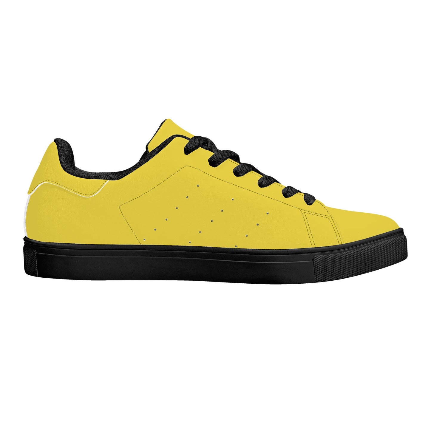Solid marigold yellow Ackee Walkers low top sneakers, black laces and black outsole