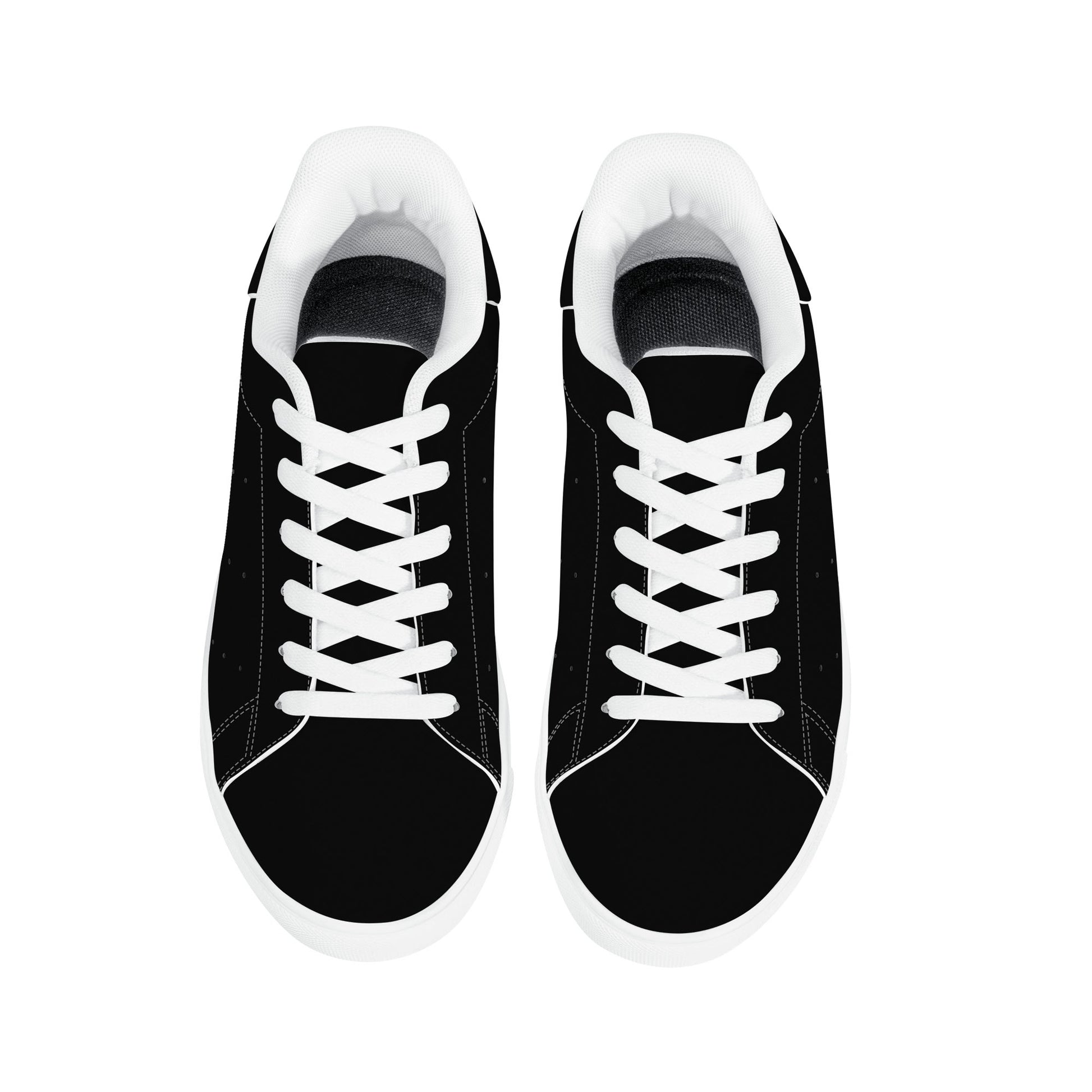 All-black Jamaica flag Ackee Walkers low top sneakers with black laces, black outsole and a green and gold Jamaican flag chevron at the heel