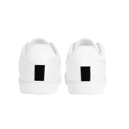 Solid white Ackee Walkers low top sneakers, black laces and black outsole