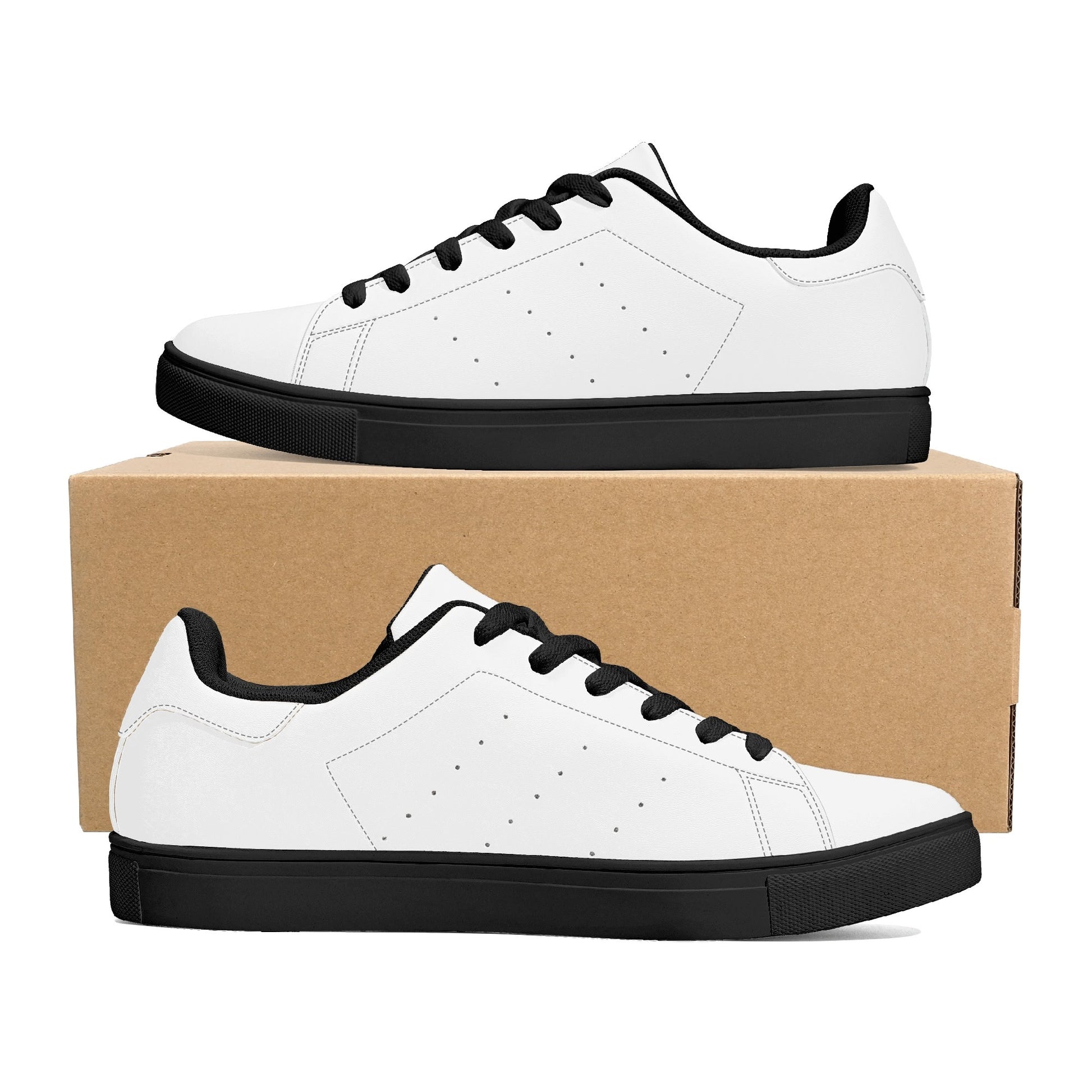 Solid white Ackee Walkers low top sneakers, black laces and black outsole