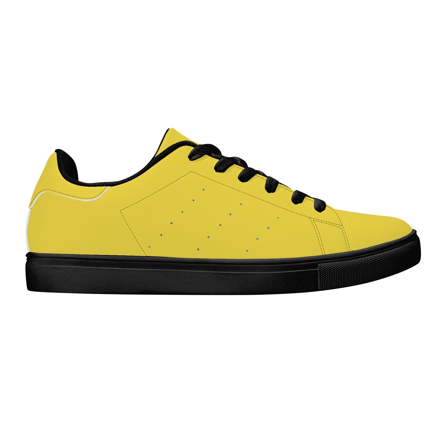 Solid marigold yellow Ackee Walkers low top sneakers, black laces and black outsole