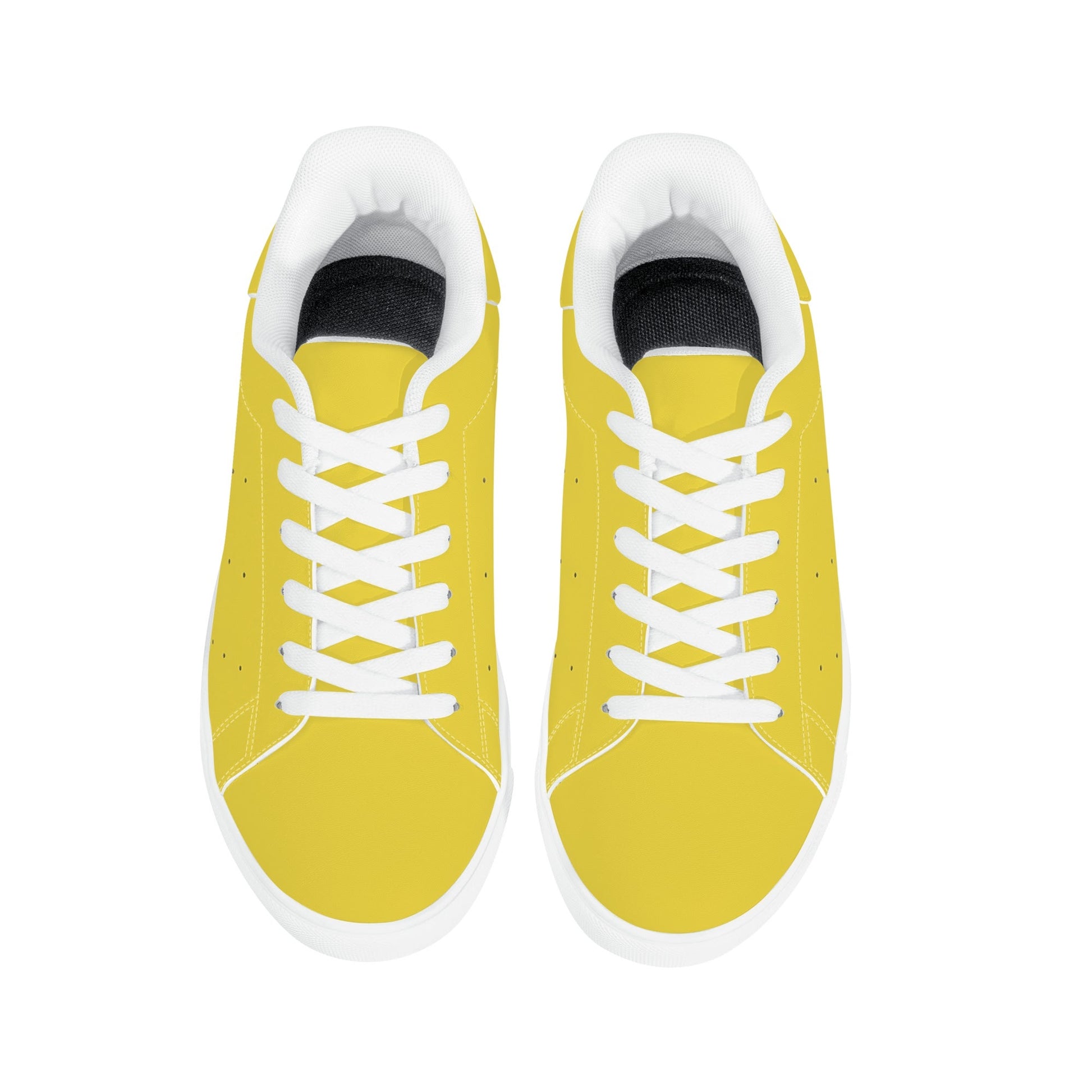 Solid marigold yellow Ackee Walkers low top sneakers, black laces and black outsole