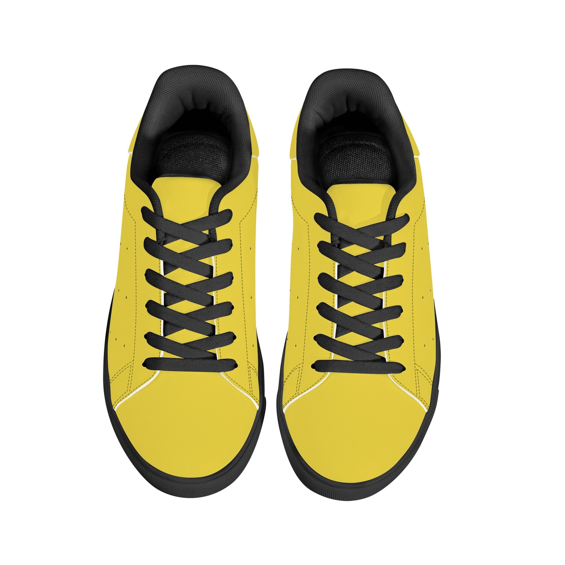 Solid marigold yellow Ackee Walkers low top sneakers, black laces and black outsole