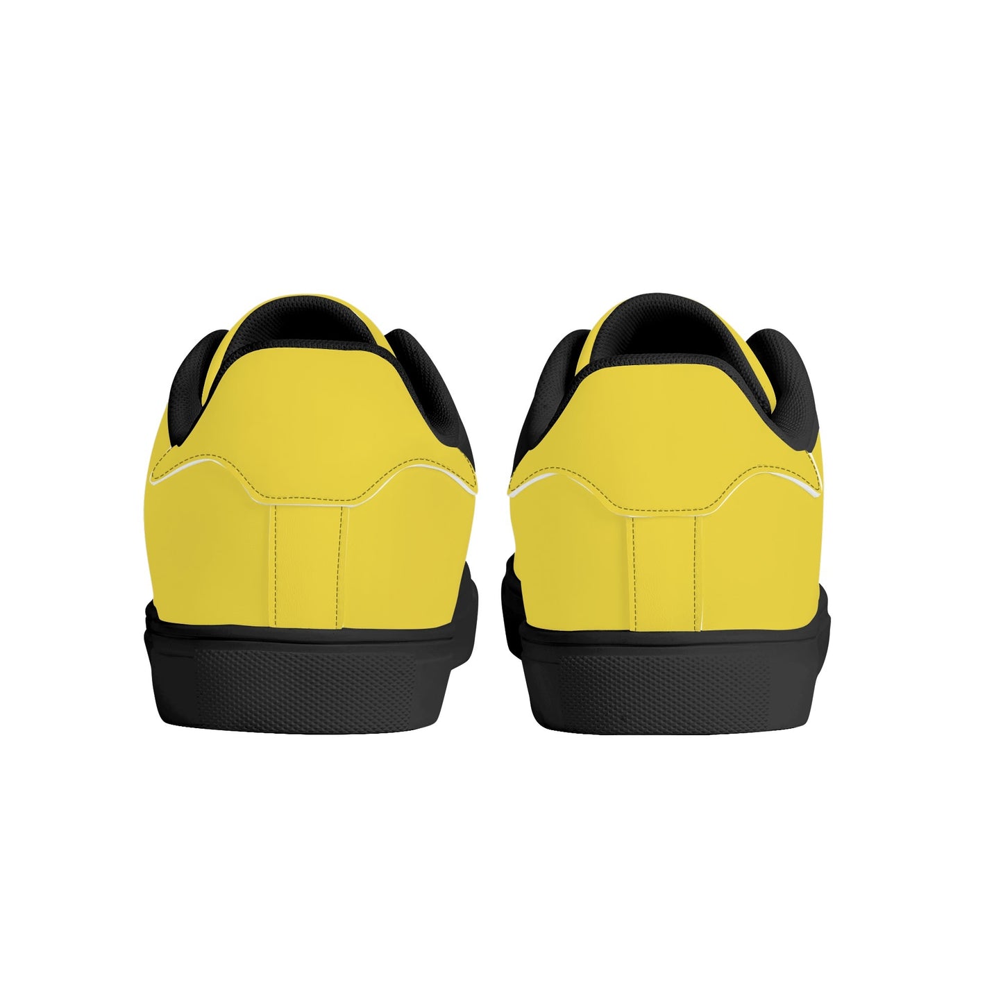 Solid marigold yellow Ackee Walkers low top sneakers, black laces and black outsole