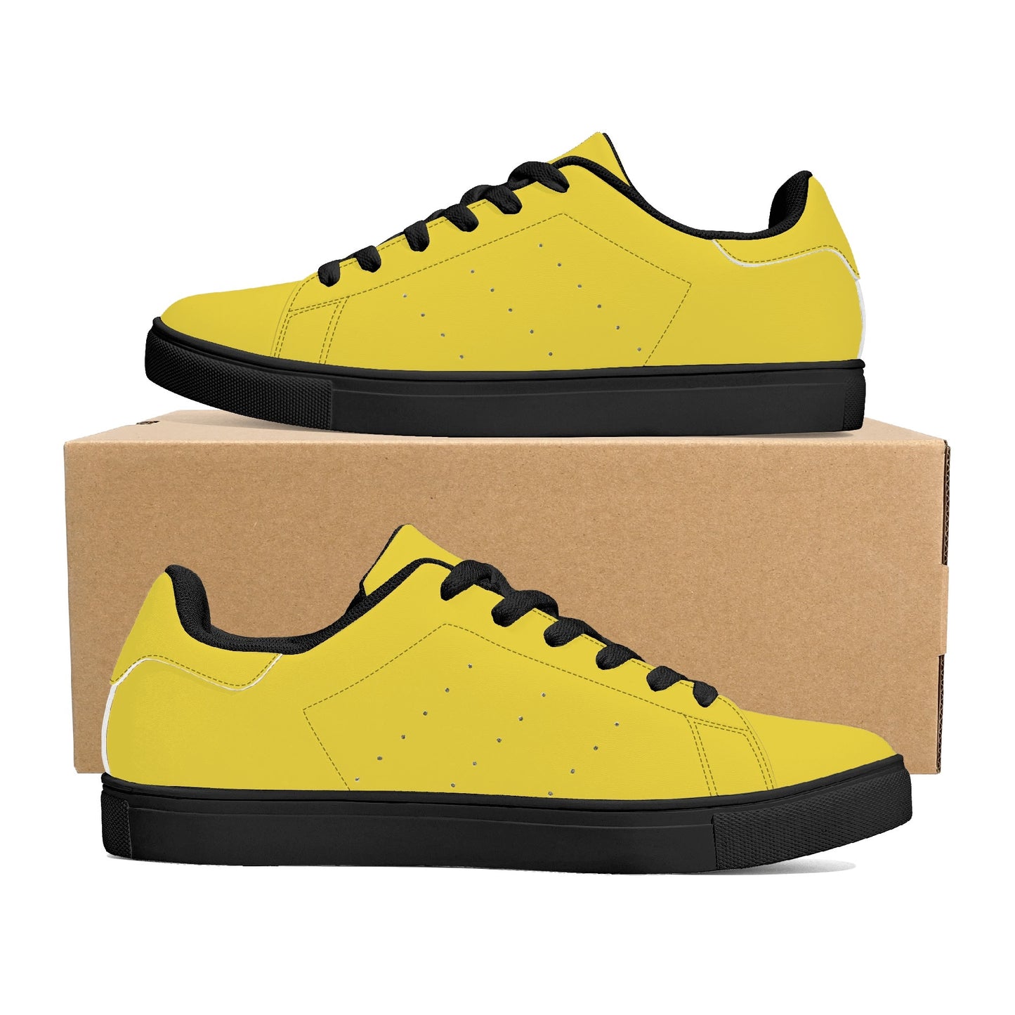 Solid marigold yellow Ackee Walkers low top sneakers, black laces and black outsole