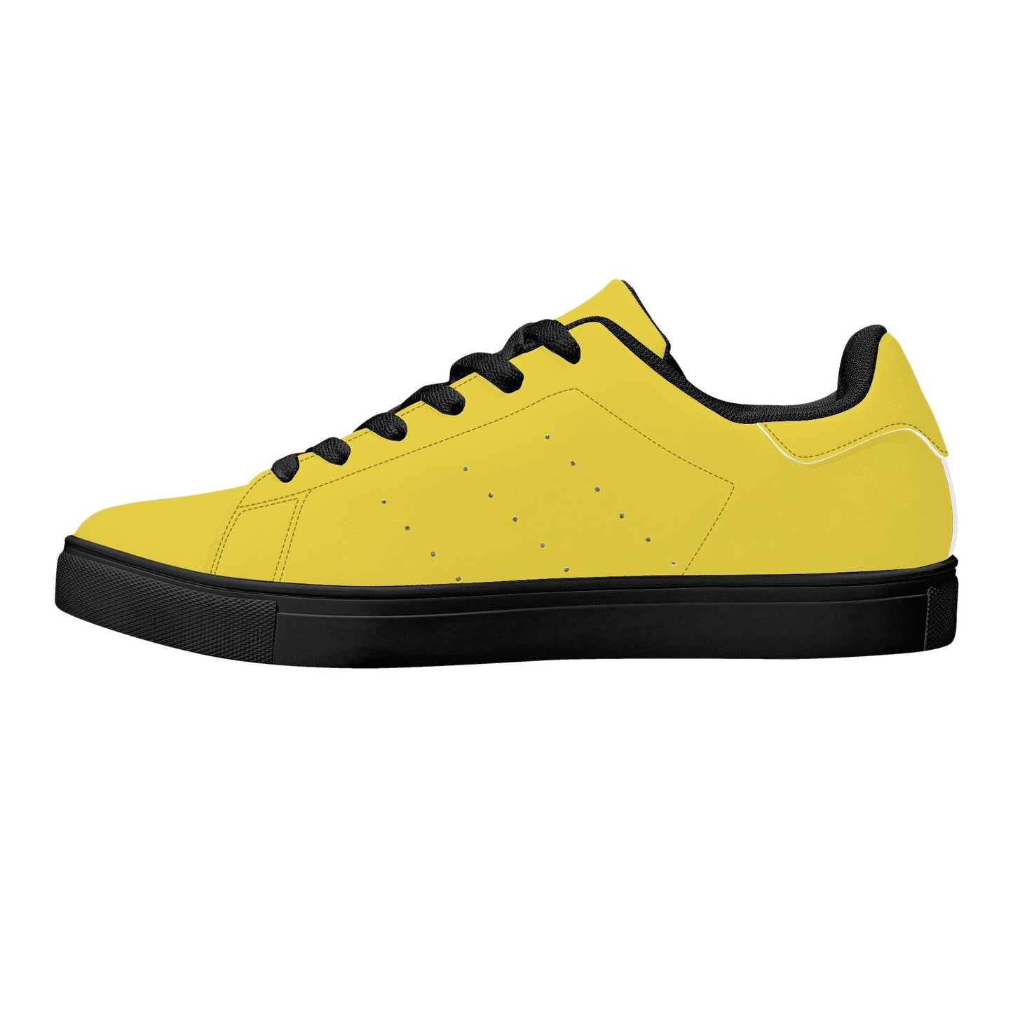 Solid marigold yellow Ackee Walkers low top sneakers, black laces and black outsole