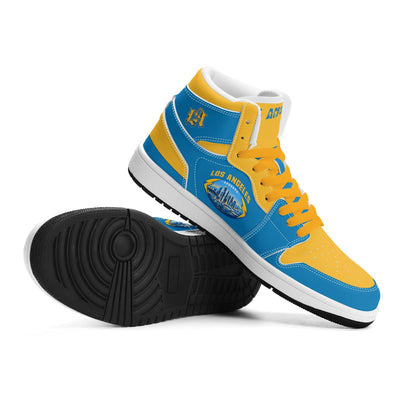 Los Angeles football-inspired Jamrock High top sneakers in aqua and gold with LA monogram collar and skyline artwork inside a football