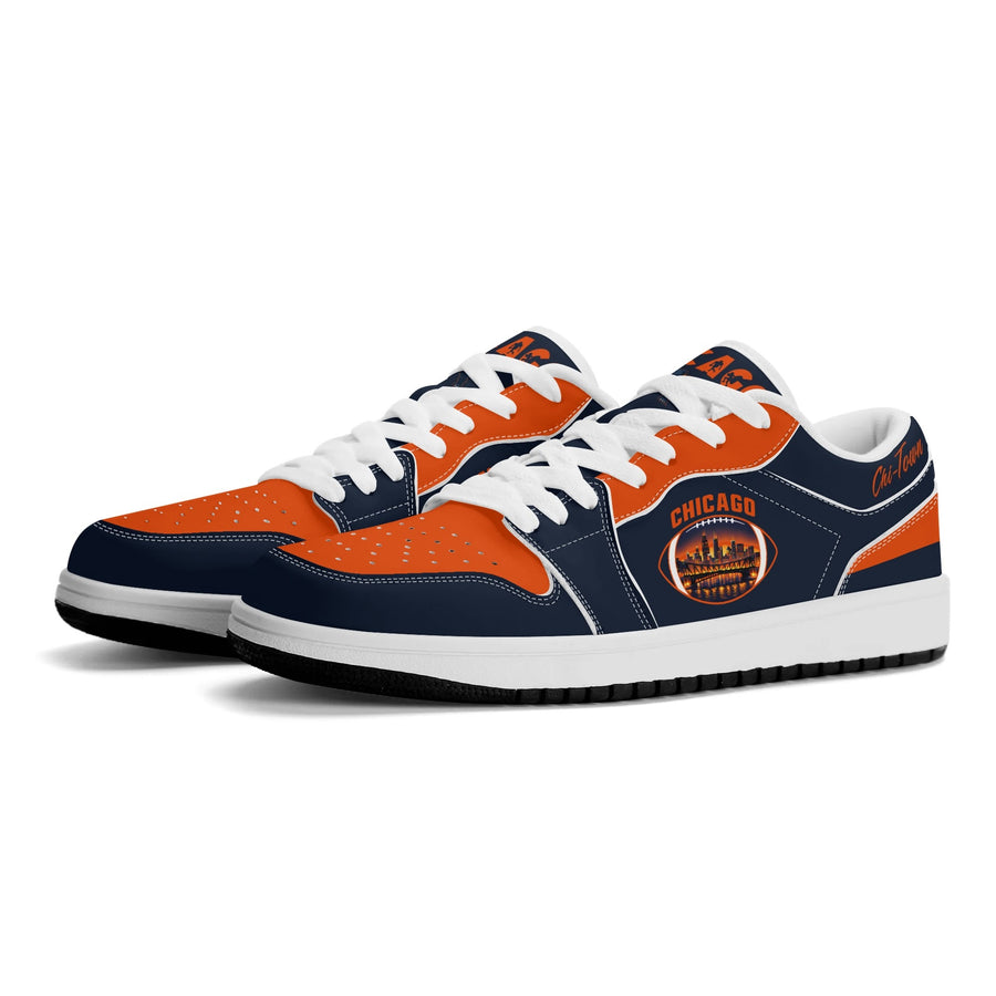 Chicago football Jamrock Low top sneakers in navy, orange with football badge with the skyline lit up at dusk