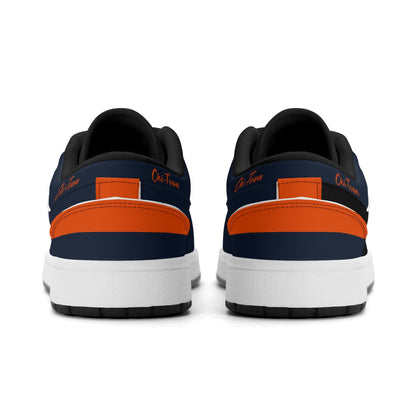 Chicago football Jamrock Low top sneakers in navy, orange with football badge with the skyline lit up at dusk