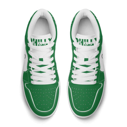 Philadelphia football Jamrock Low top sneakers in green, white with bold city mascot graphic on the quarter panel