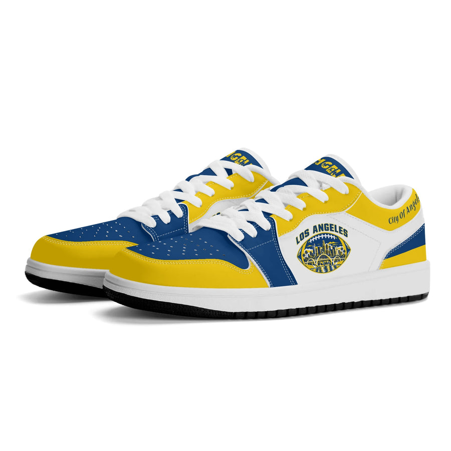 Los Angeles football low tops in white, royal blue and yellow with a skyline football badge, three-quarter view, white laces