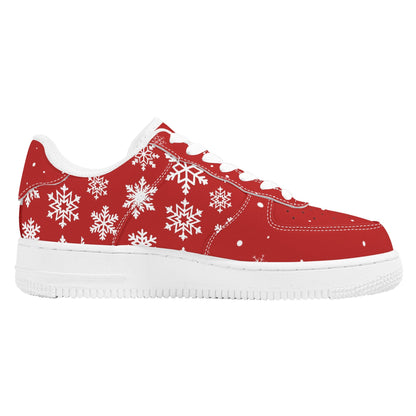 Opposite side of a red Christmas low top with white snowflakes, snow dots on the toe and a white sole
