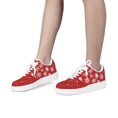 Red Christmas snowflake low tops with white laces and white soles, shown on feet