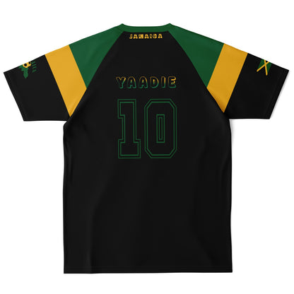 Plain back of the black Jamaica jersey showing Yaadie and number 10 in green with no map graphic.
