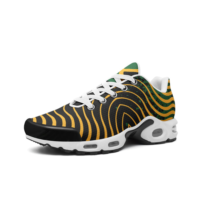 Black mesh running sneakers with gold wave line print, a green speckled heel, white laces and a cushioned white midsole