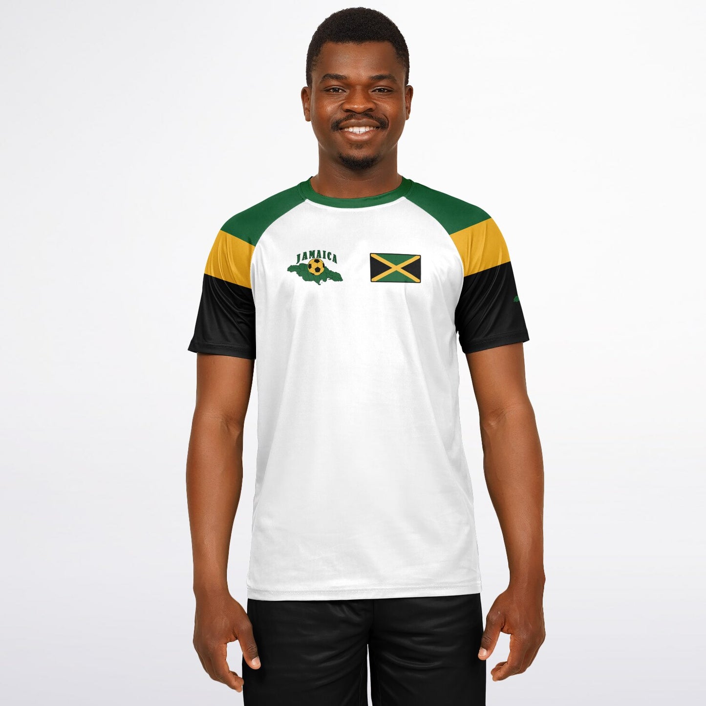 Man wearing the white Jamaica soccer jersey with black shorts, front chest flag visible.