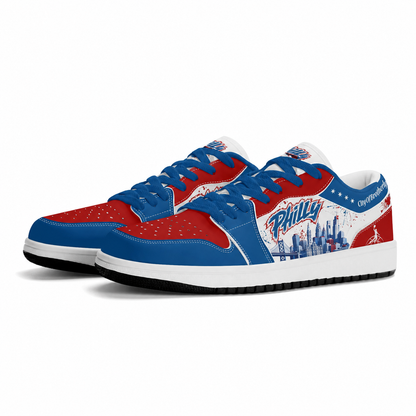 Philadelphia basketball-inspired Jamrock Low sneakers in red, white, and blue with blue laces, angled pair view