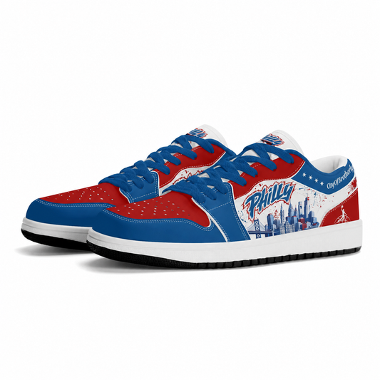 Philadelphia basketball-inspired Jamrock Low sneakers in red, white, and blue with blue laces, angled pair view