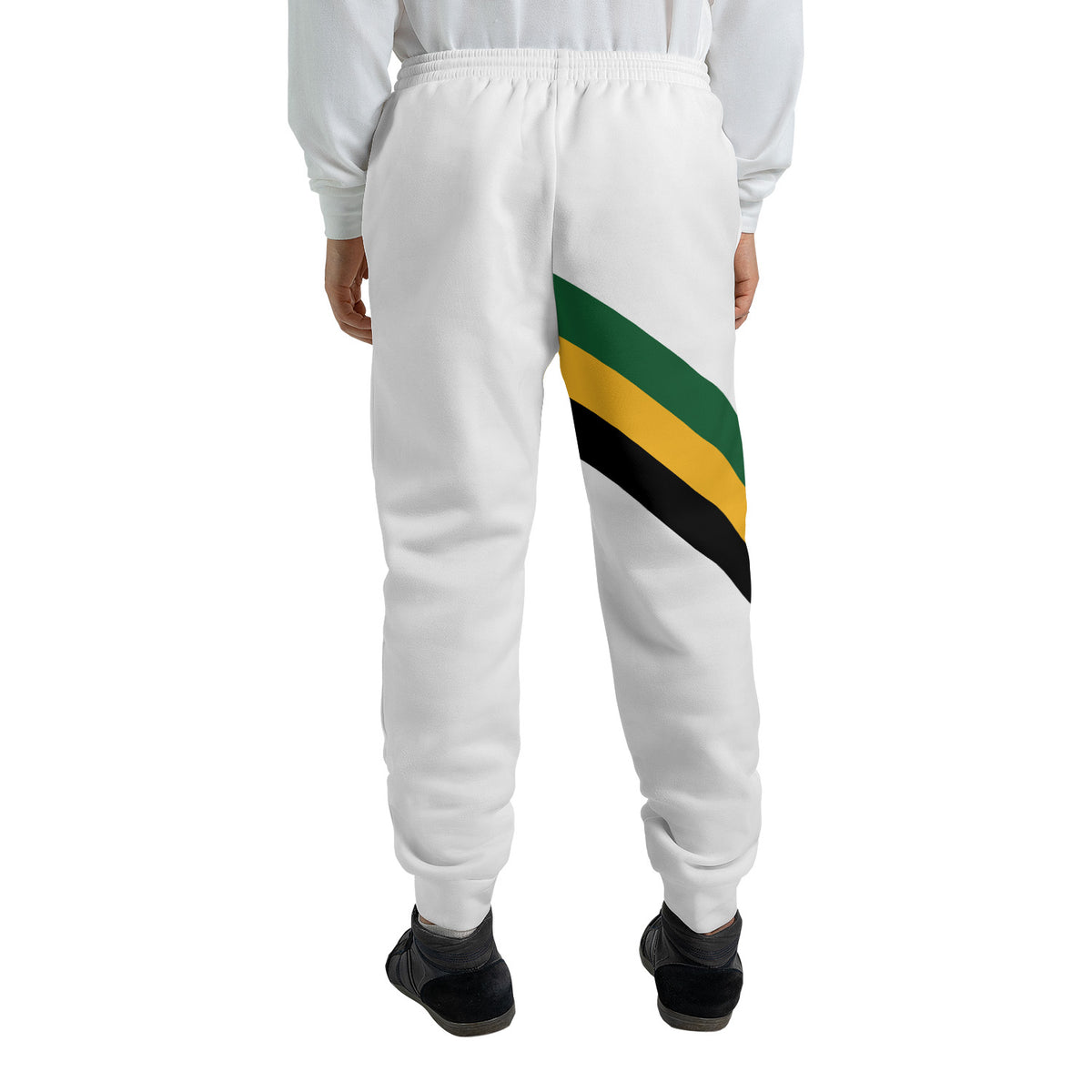 White Jamaica Yaadie Pride jogger sweatpants with a green, gold and black diagonal sash on the thigh and a Jamaican flag hip print