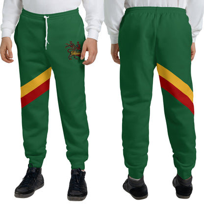 Green Rasta Lion of Judah jogger sweatpants with a gold and red diagonal sash and a Selassie lion crest at the hip
