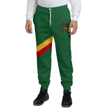 Green Rasta Lion of Judah jogger sweatpants with a gold and red diagonal sash and a Selassie lion crest at the hip