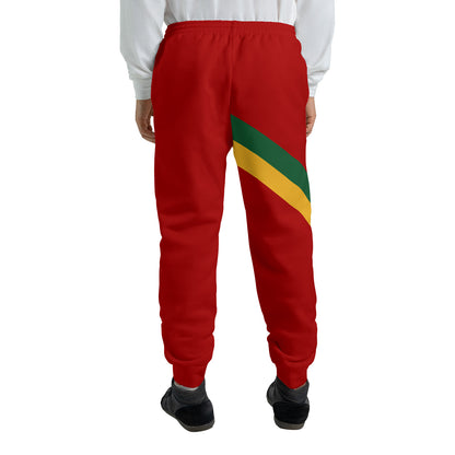 Red Rasta Lion of Judah jogger sweatpants with a green and gold diagonal sash and a Selassie lion crest at the hip
