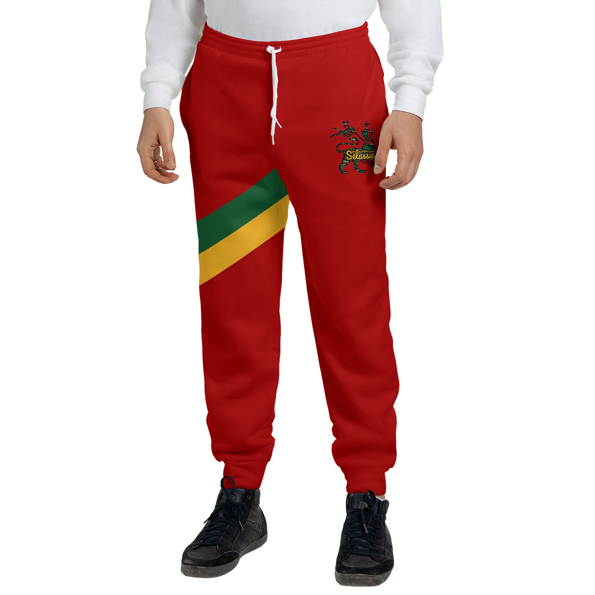 Red Rasta Lion of Judah jogger sweatpants with a green and gold diagonal sash and a Selassie lion crest at the hip