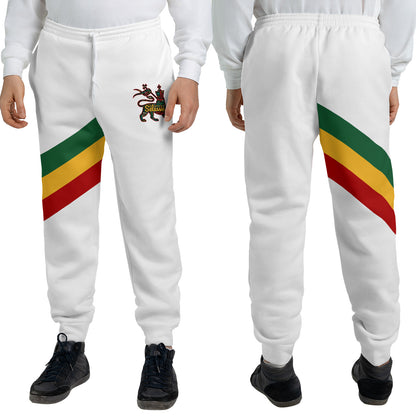 White Rasta Lion of Judah jogger sweatpants with a green, gold and red diagonal sash and a Selassie lion crest at the hip