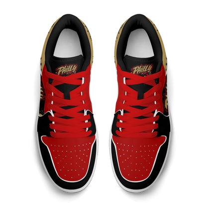 Philadelphia basketball-inspired Jamrock Low sneakers in black with red laces, top-down view of the pair