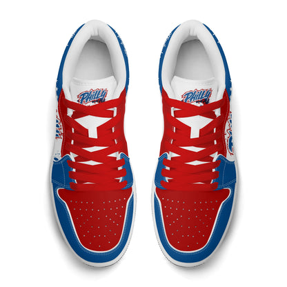 Philadelphia basketball-inspired Jamrock Low sneakers in red, white, and blue with red laces, top-down view of the pair
