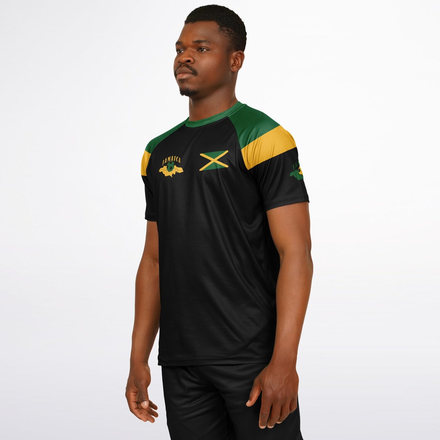 Side angle of the black Jamaica jersey on a model, showing the sleeve island map print.