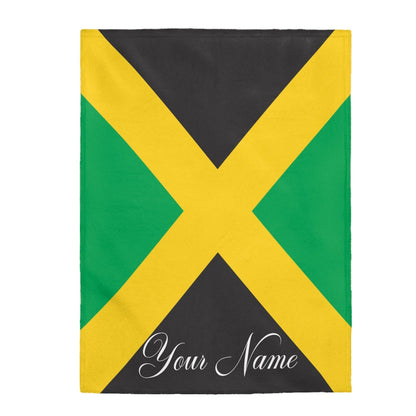 Flat view of the black, green and gold Jamaica flag blanket with a name in script near the base.